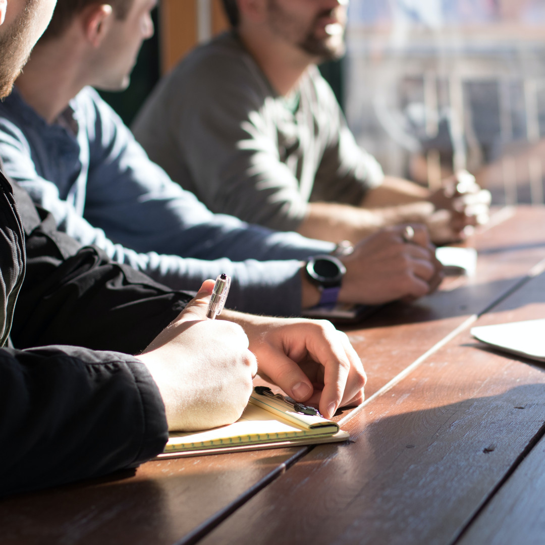 Picture of people sitting at a desk